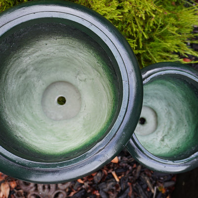 Inside of dark green pots