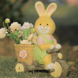 bunny sister riding bike carrying flower