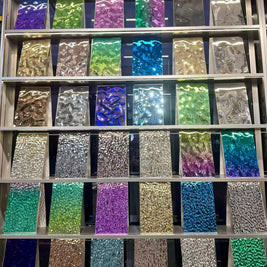 Coloured Water Ripple Stainless Steel on shelfs 