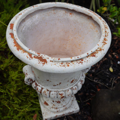 top view of Medici Urn with rust details