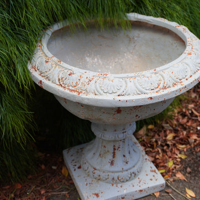 top view of rust/aged urn