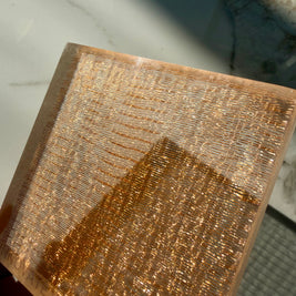 close up of the golden mesh panel