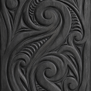 carved maori koru wood panel
