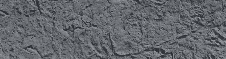 black structured rock panel close up