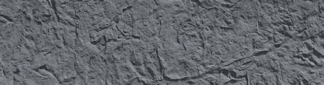 black structured rock panel close up